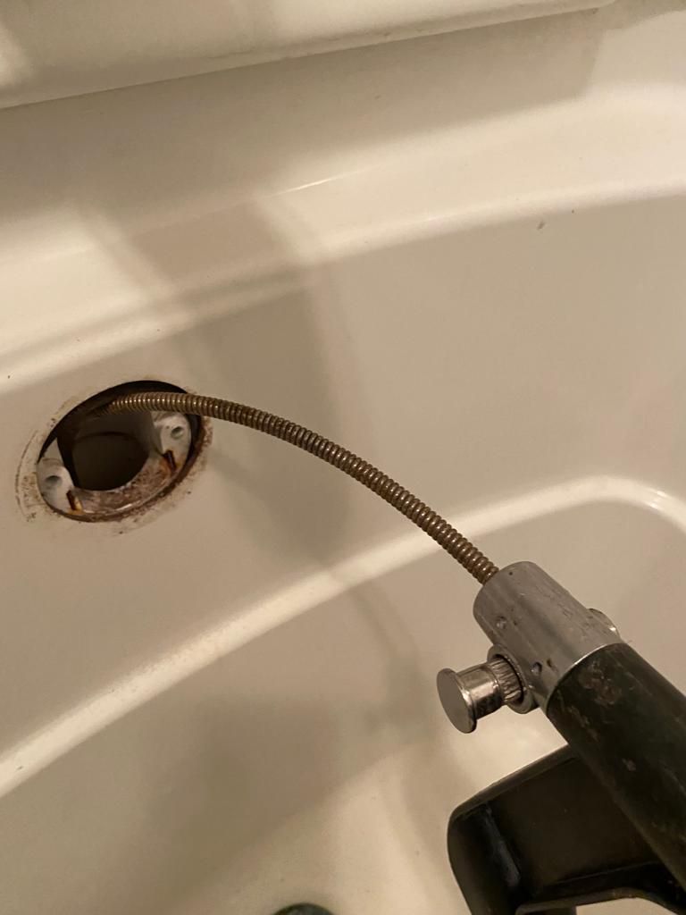 Bathtub Unclogging