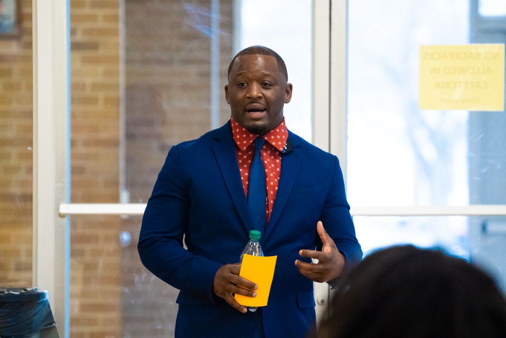 Talking to a group of high school students on the 
