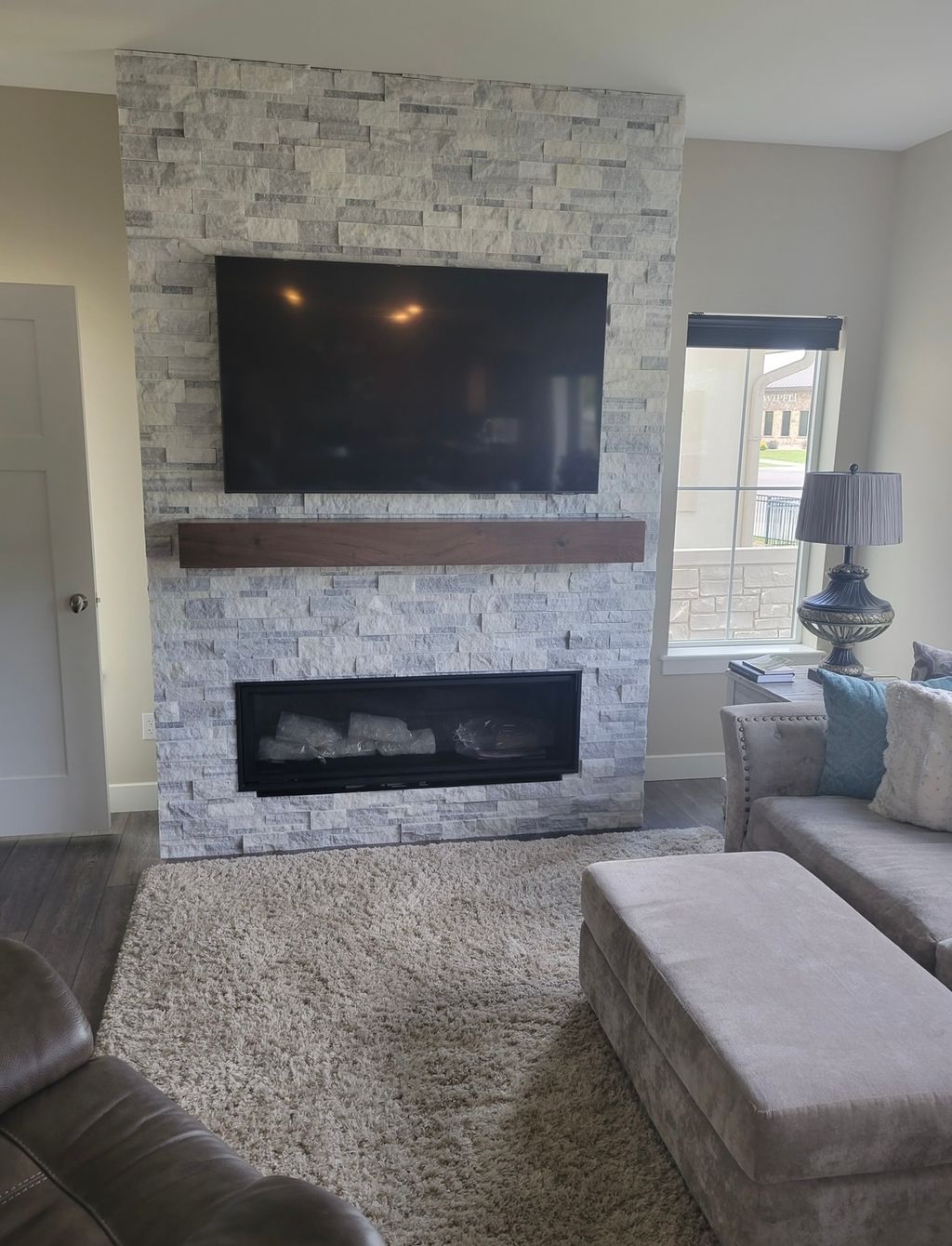 Hearth build w/ mantel and electric fireplace inse