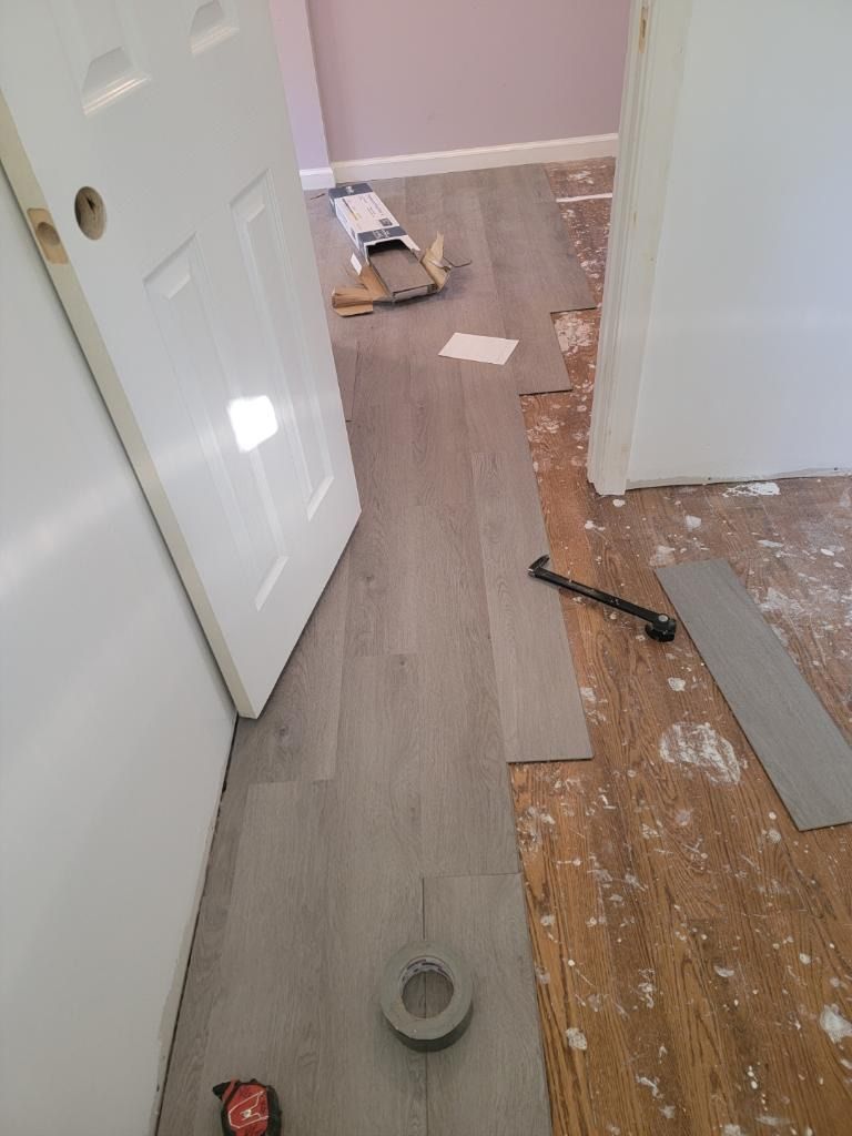 New laminate flooring installation in progress by 