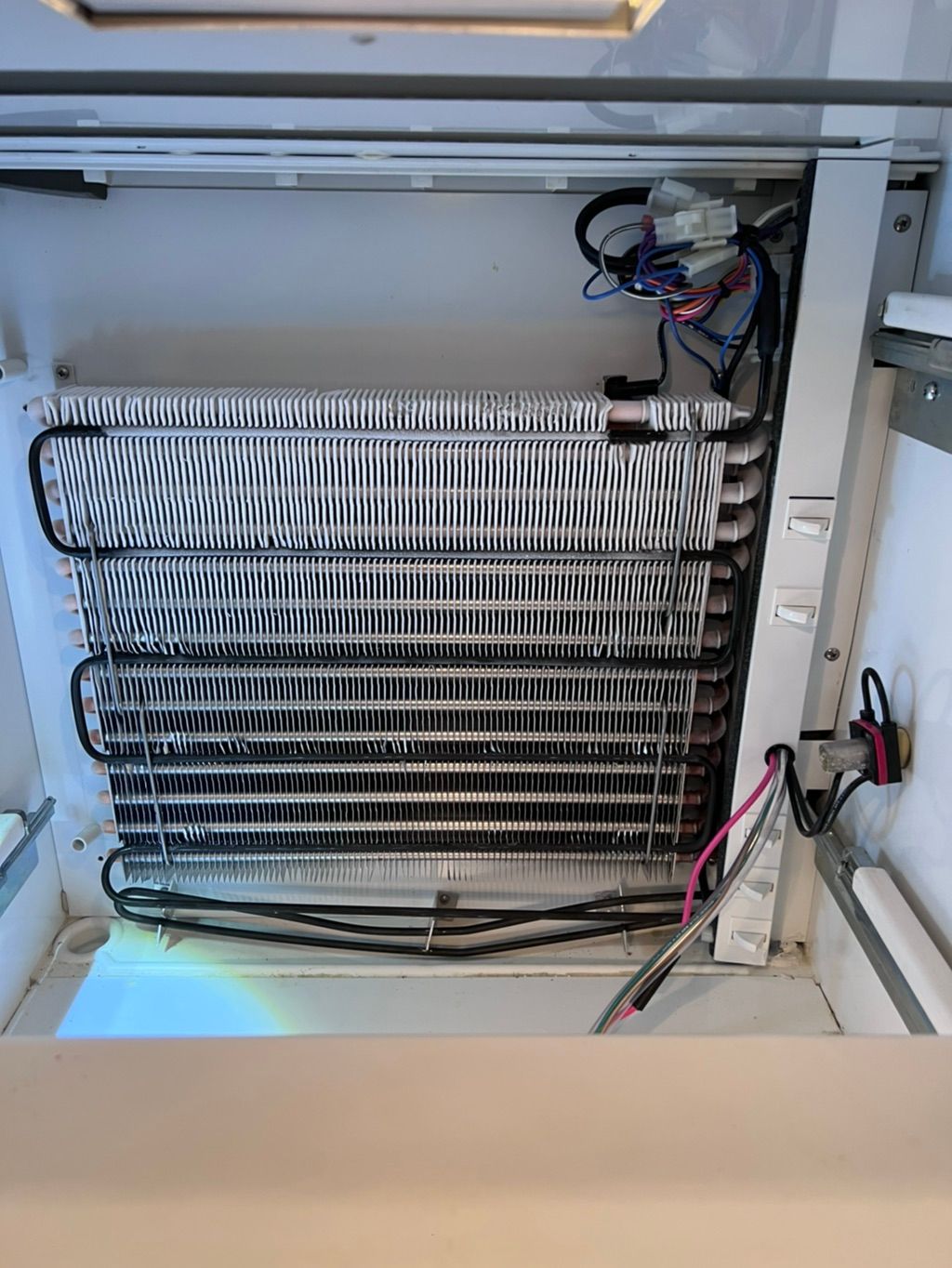 Freezer evaporator coil installation 