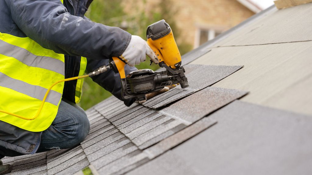 roofing installing asphalt shingles