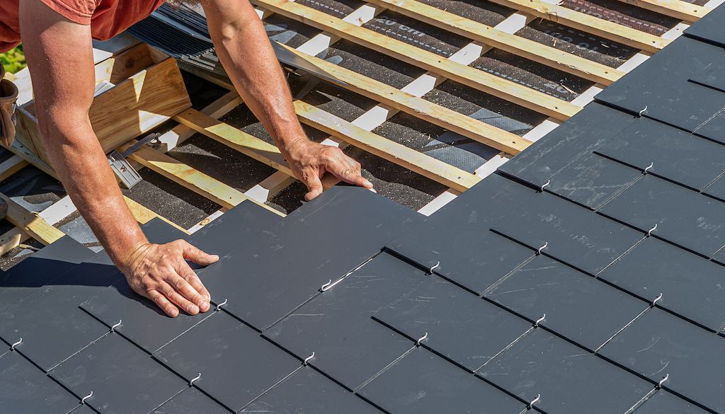 roofers installing slate roof