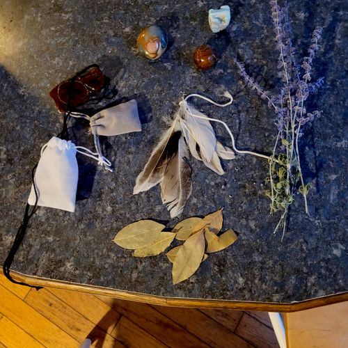 making Talisman bags for clients; spiritually base