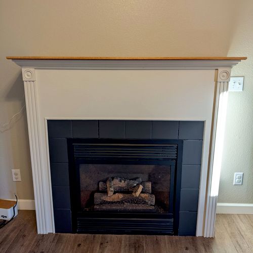 Evan did a great job painting our fireplace, trim,