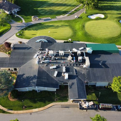 New epdm roof installation over country club