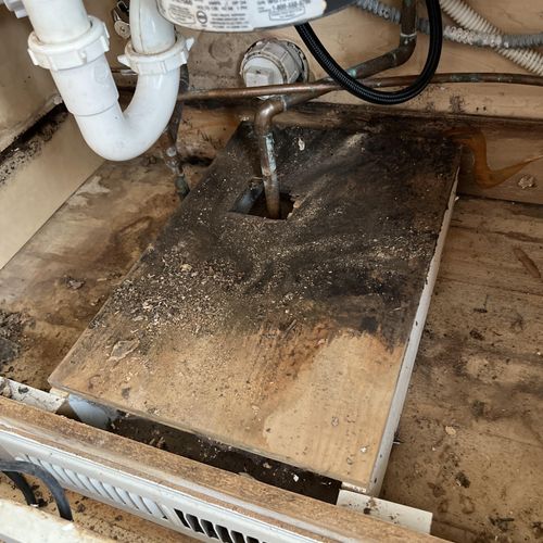 Mold under sink, heating vent made of wood