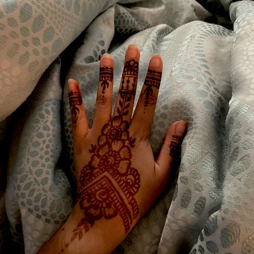 She did an excellent job with my henna. Even thoug