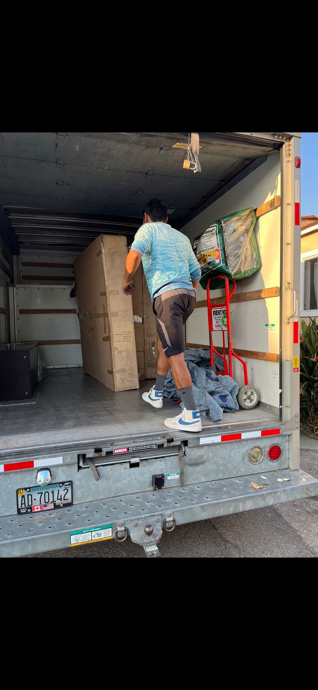 Here we are organizing some furniture in the truck