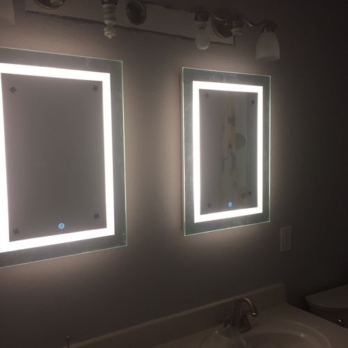 Installed two LED touch mirrors in restroom for cu