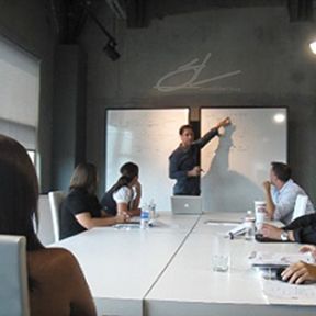 Steven conducting on-site company sales training, 