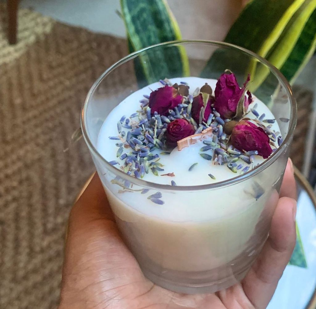 All candles are topped with dried flowers and herb
