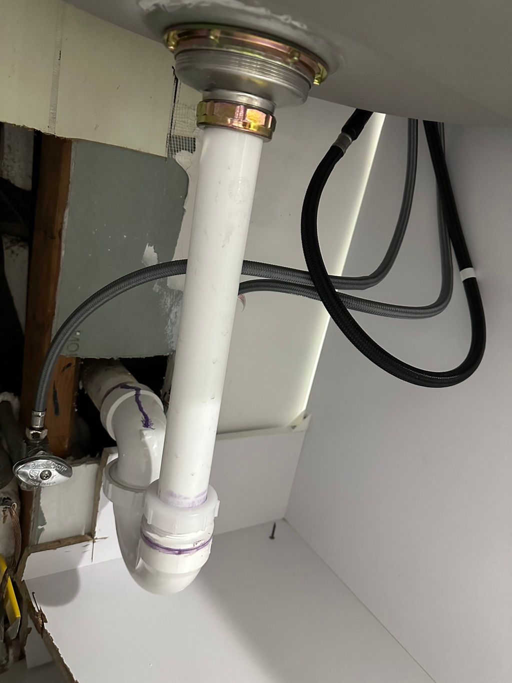 New plumbing under laundry room sink