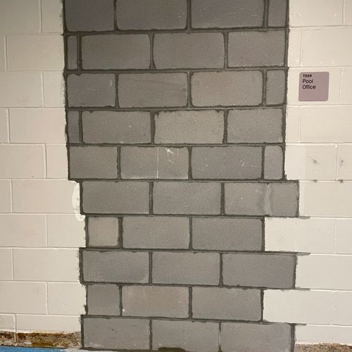 Excellent repair job to a block wall where a door 