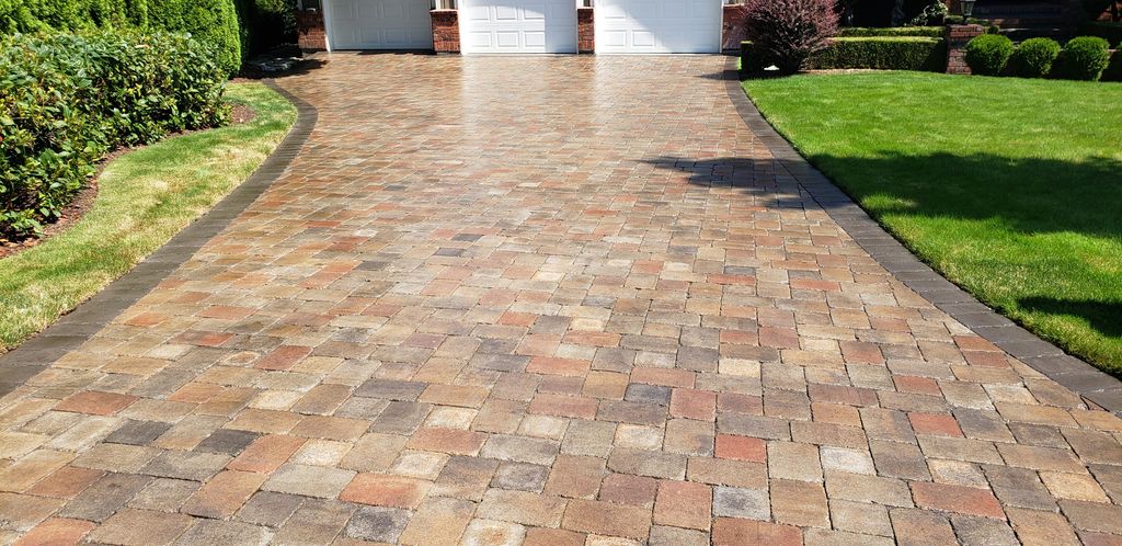 Driveway pavers post-sealant application.