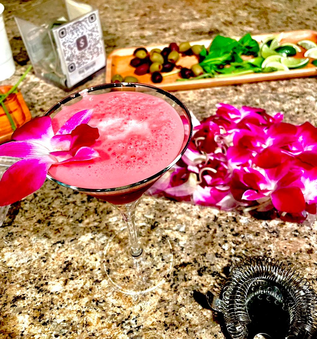 The Hibiscus Craze handcrafted signature cocktail,