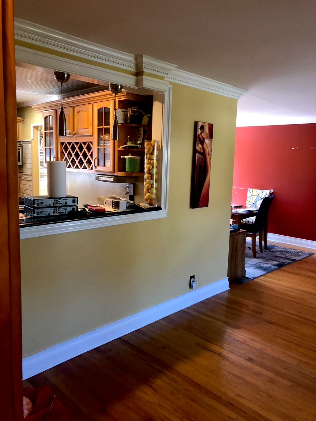 Created an opening between kitchen and living room