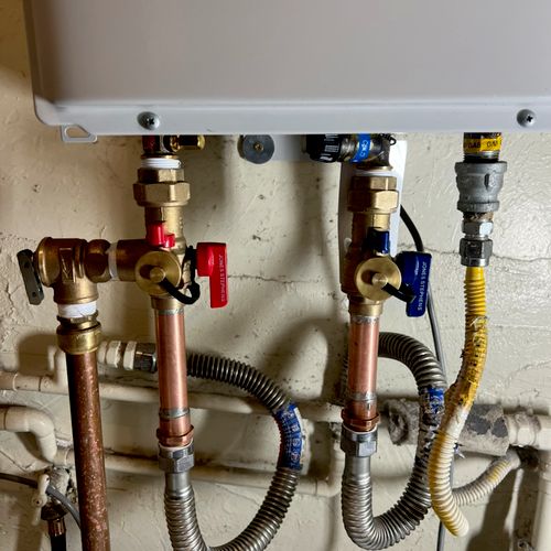 Isolator valves for tank less water heater 