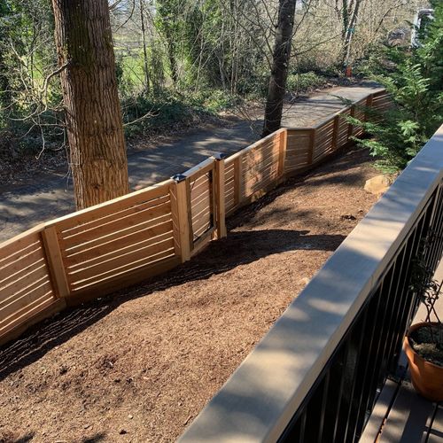 These guys built me a beautiful horizontal fence! 