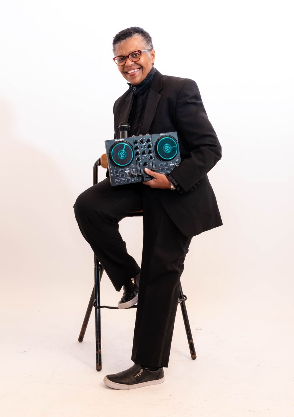 DJ Myra (suited)