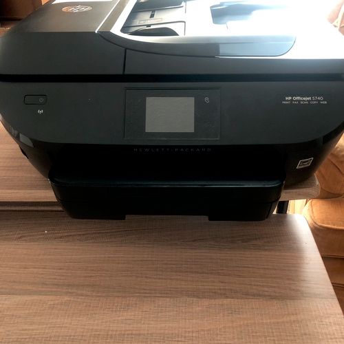 My HP OfficeJet Pro 5740 had a “ghost” paper jam t