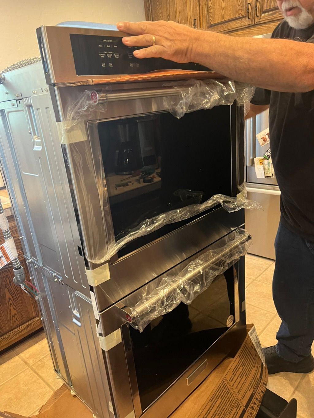 Double oven brought from the driveway into the hou