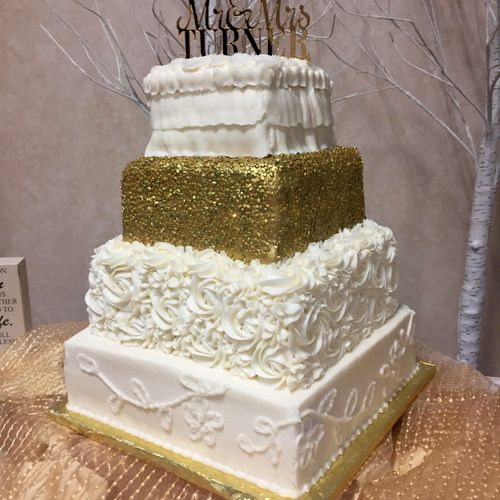 Four-tier square fondant and buttercream Cake by A
