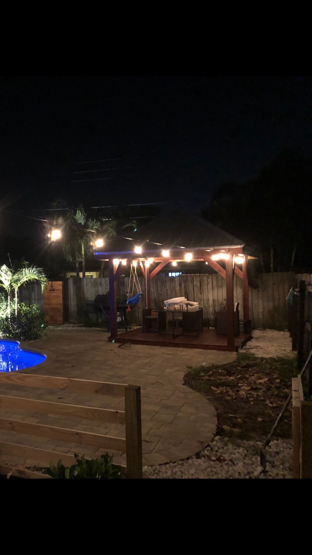 10x10 custom built gazebo with string lighting ins