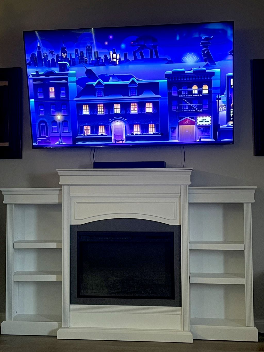 Assembled fireplace entertainment center and mount