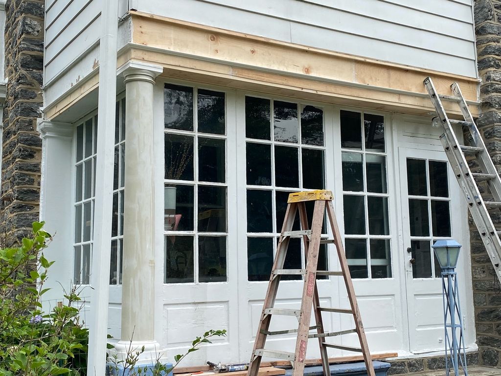 DURING. Fully rebuilt supports for exterior sun ro