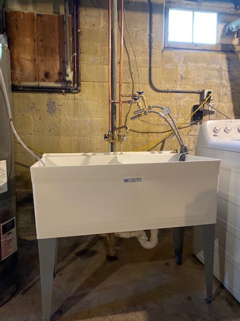 After (Double basin laundry tub)