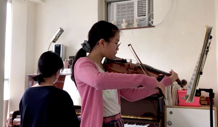 I’m the piano accompanist for my violin student. 