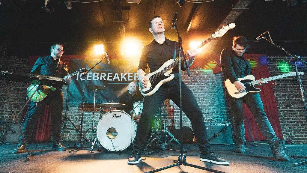 Student fronting his rock cover band in Ireland.