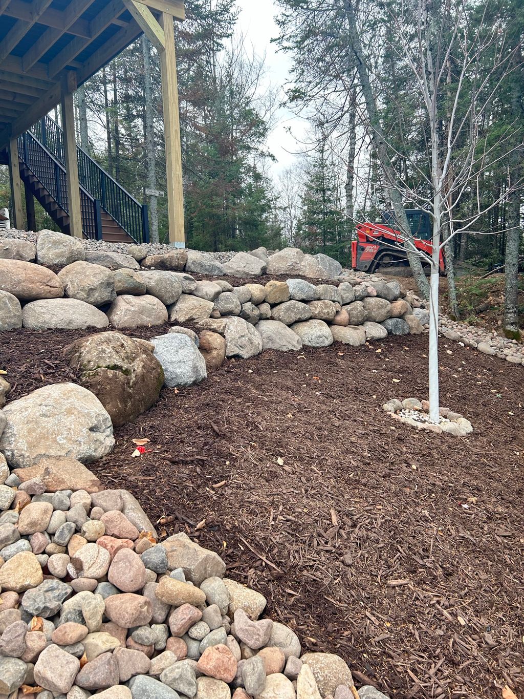 Boulder retaining wall