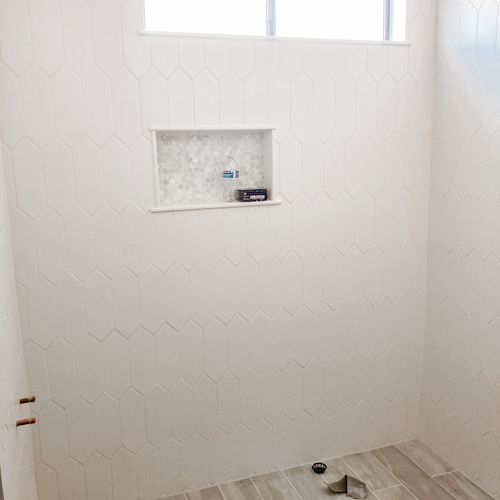 Shower install: waterproof, drainage, tile layout 