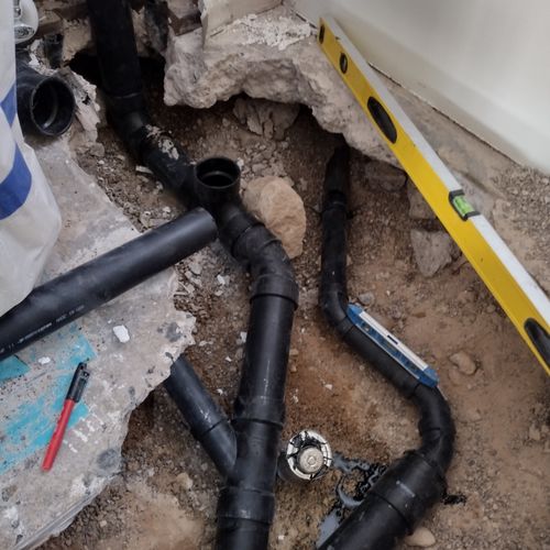 roughing in bathroom drain lines.