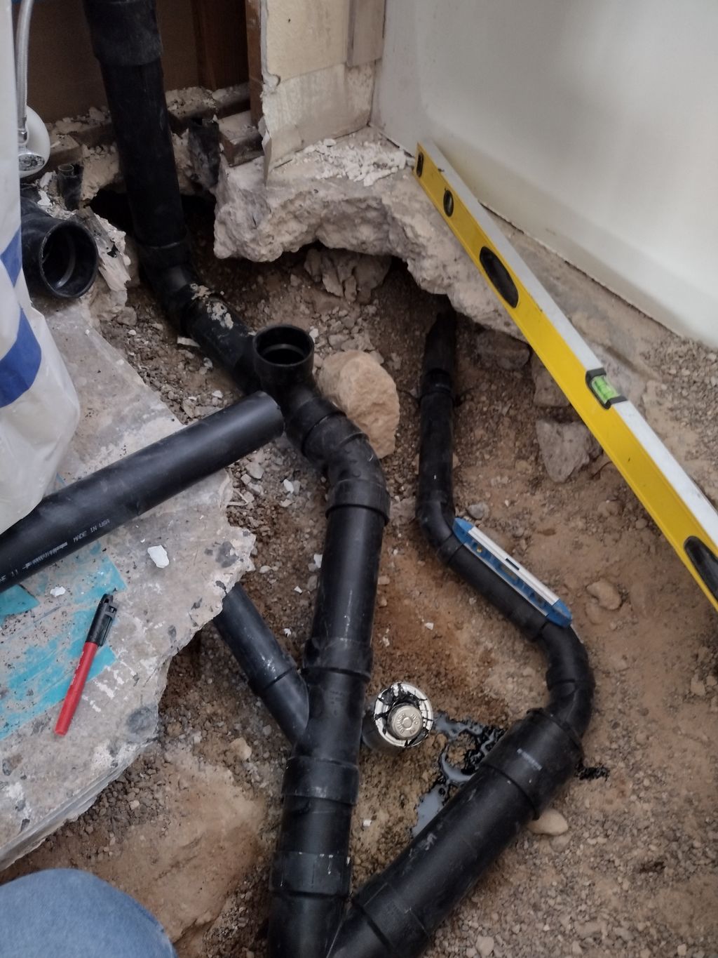 roughing in bathroom drain lines.