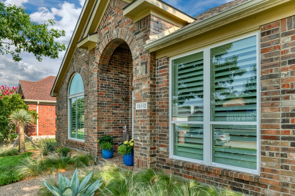 Traditions vinyl replacement windows.