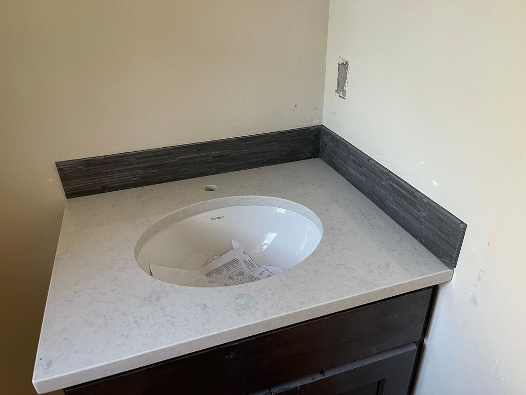 Vanity, backsplash, and sink install. 