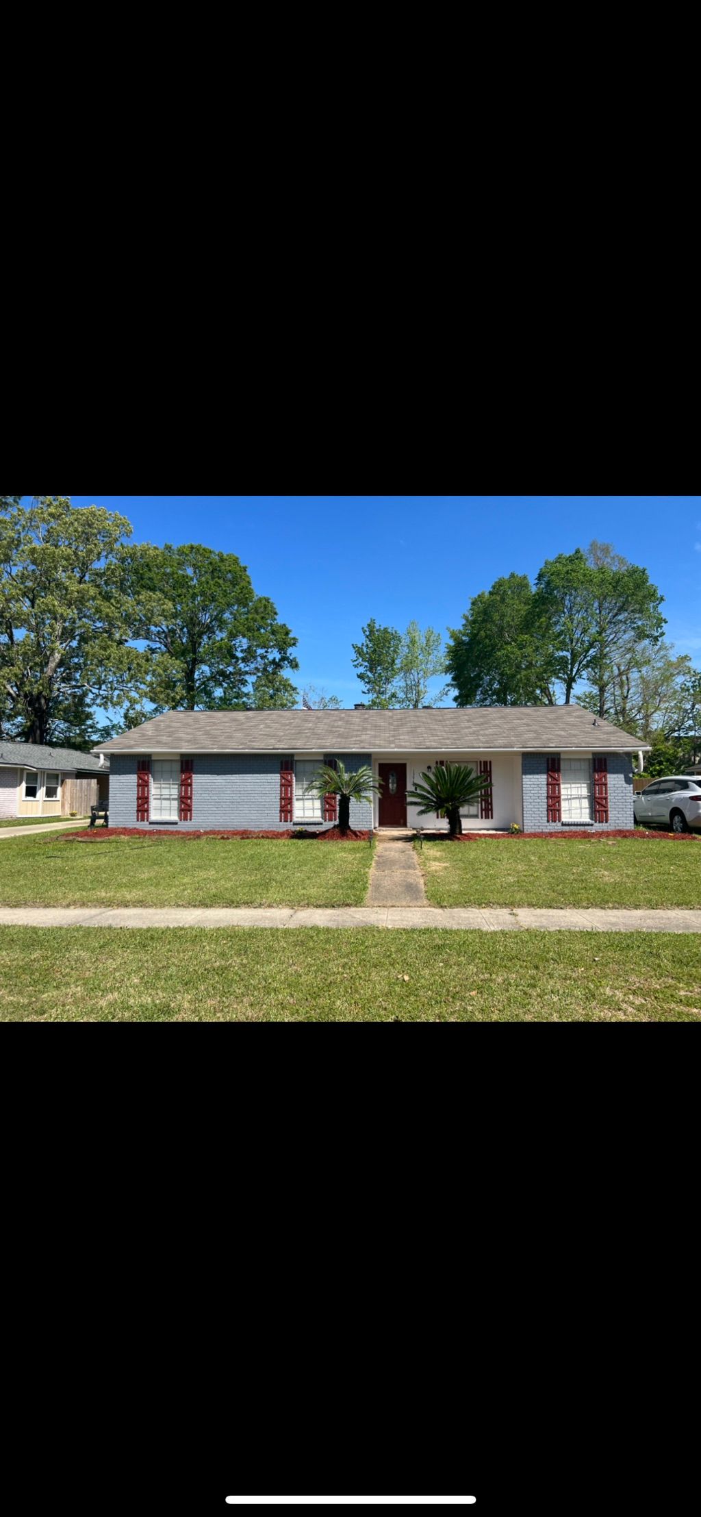 After / new roof , new landscaping , custom built 