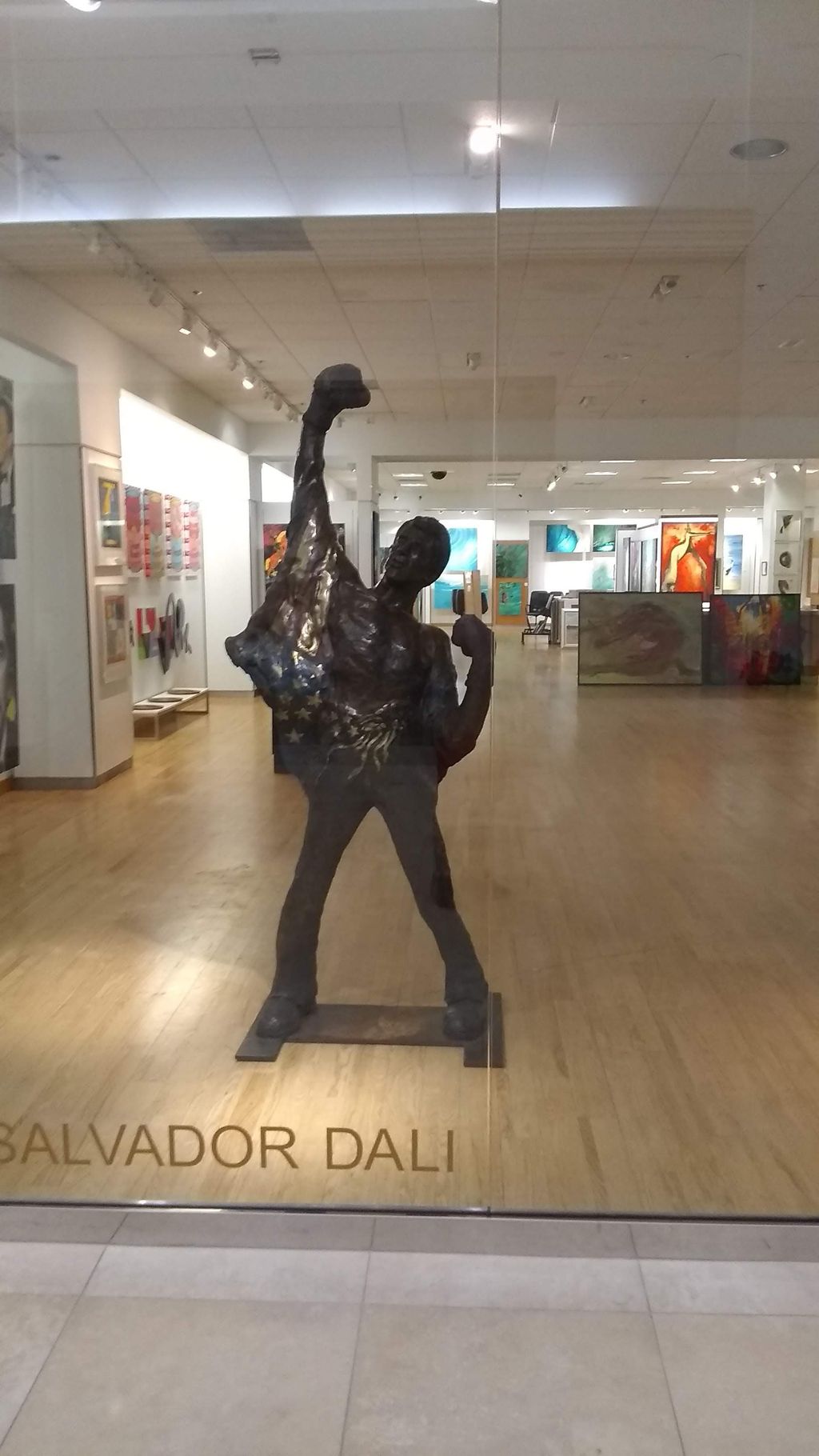 Heavy bronze statue moved into a gallery