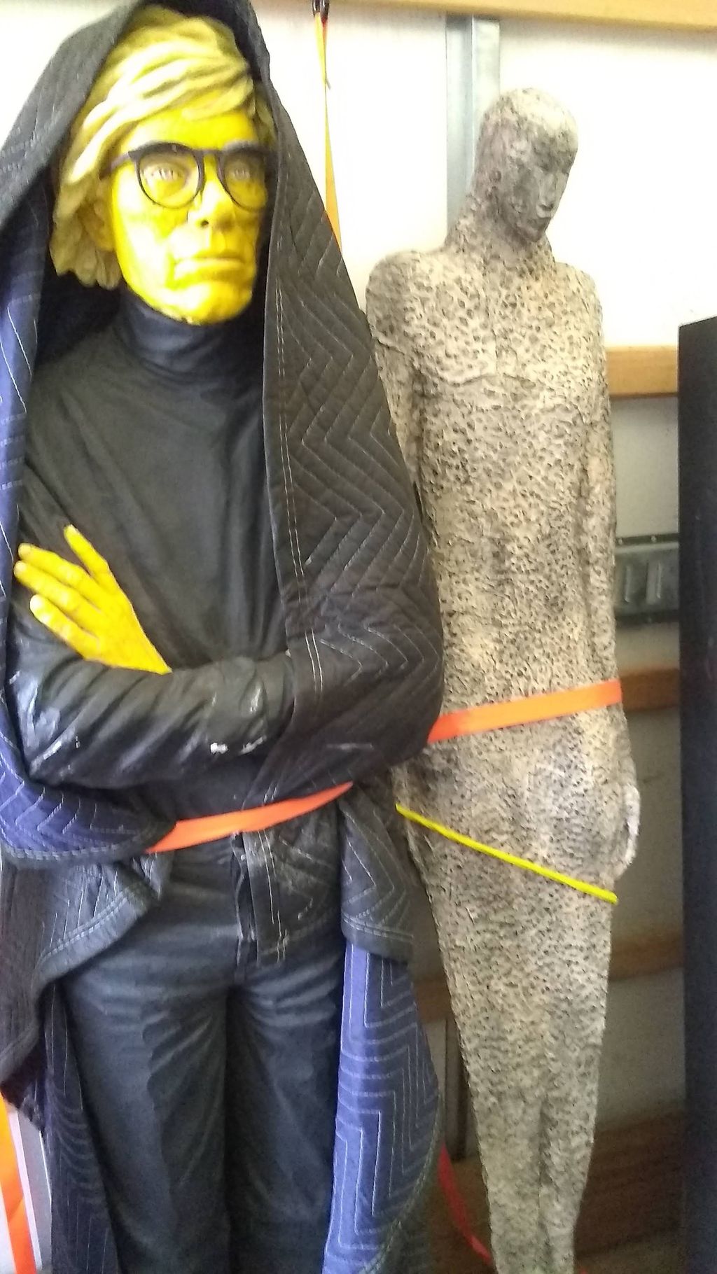 Just Kidding! Statue miving to a gallery.