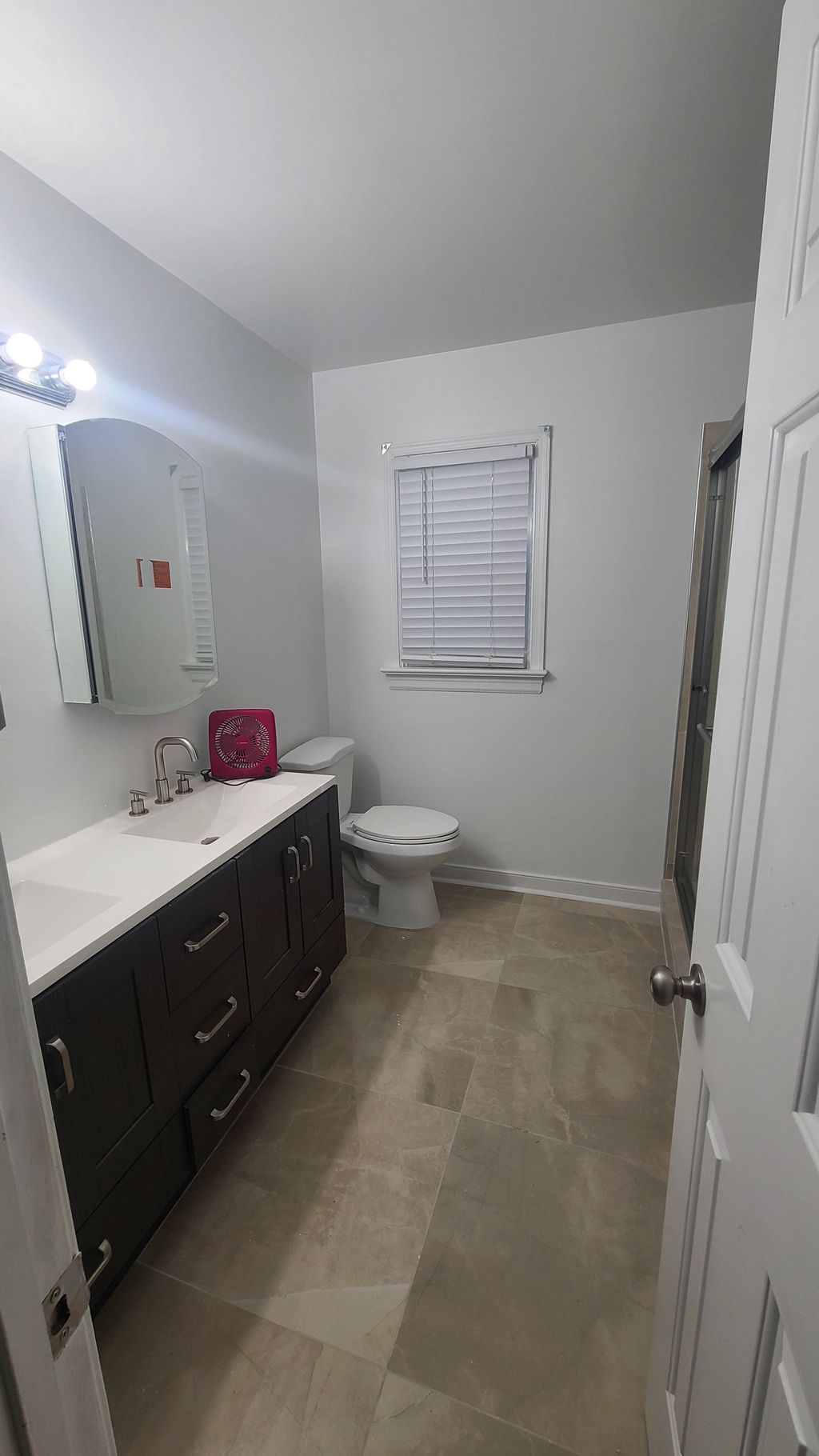 after photo. tile floors and shower new double sin