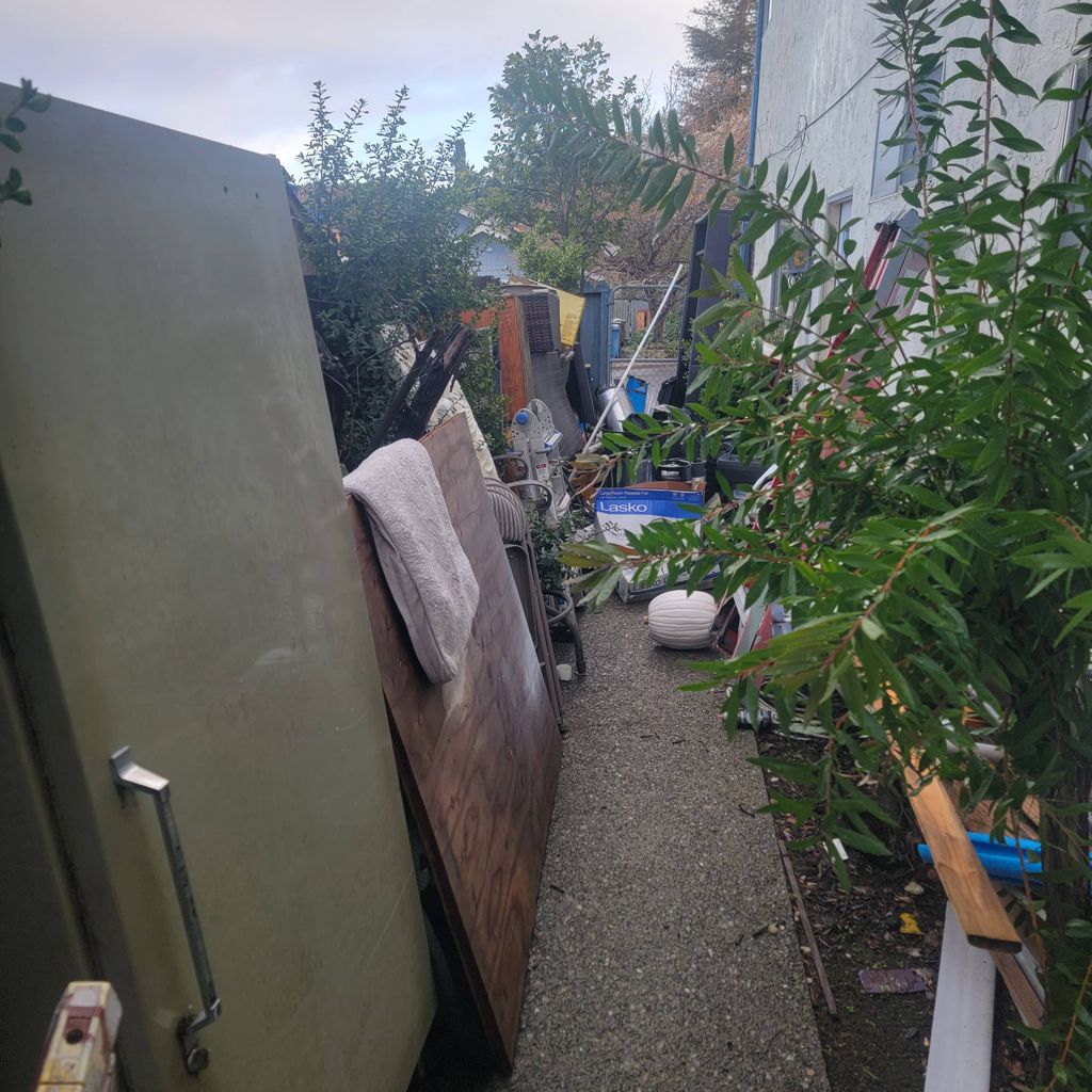 side of the house clutter, let's clean this up. 