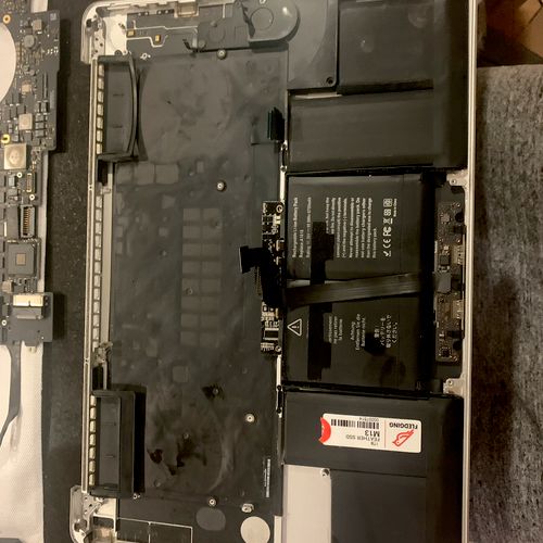Battery replacement for MacBook (removed the top c