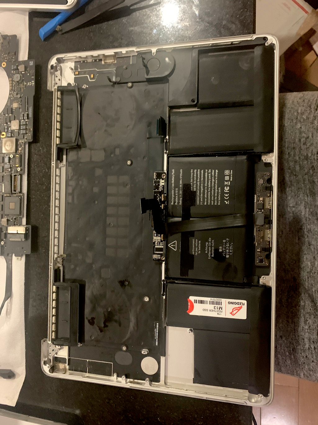 Battery replacement for MacBook (removed the top c