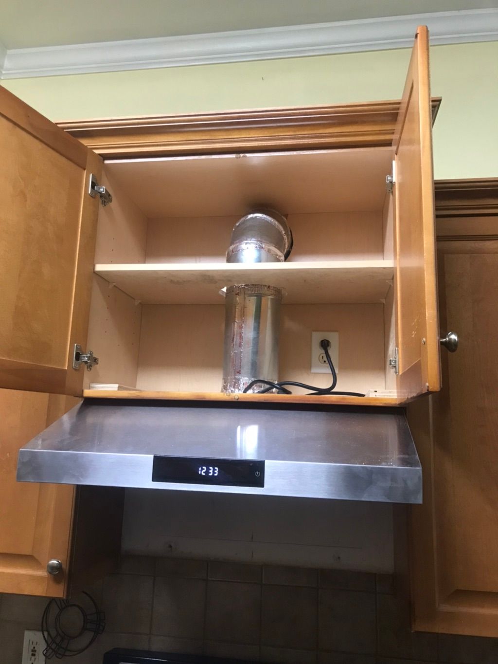 Completed range hood and vented outside 