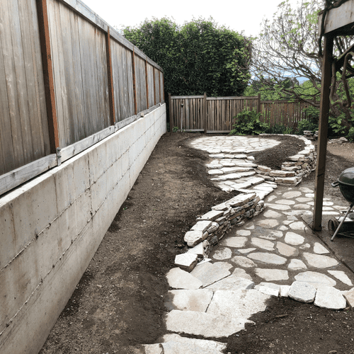 dry stack wall with pavers view from house