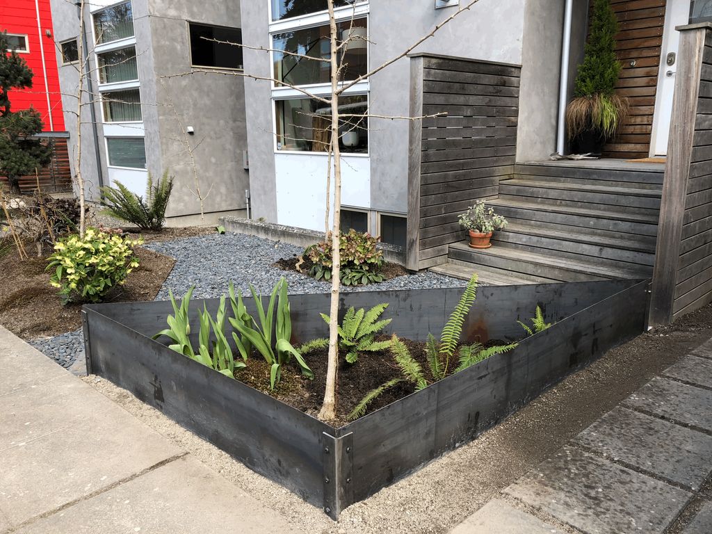condo with newly installed cor-ten planter
