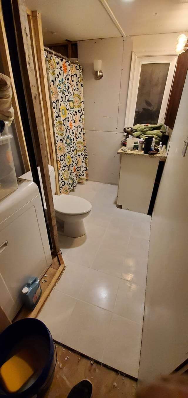 almost finished bathroom ceramic tile floor marble